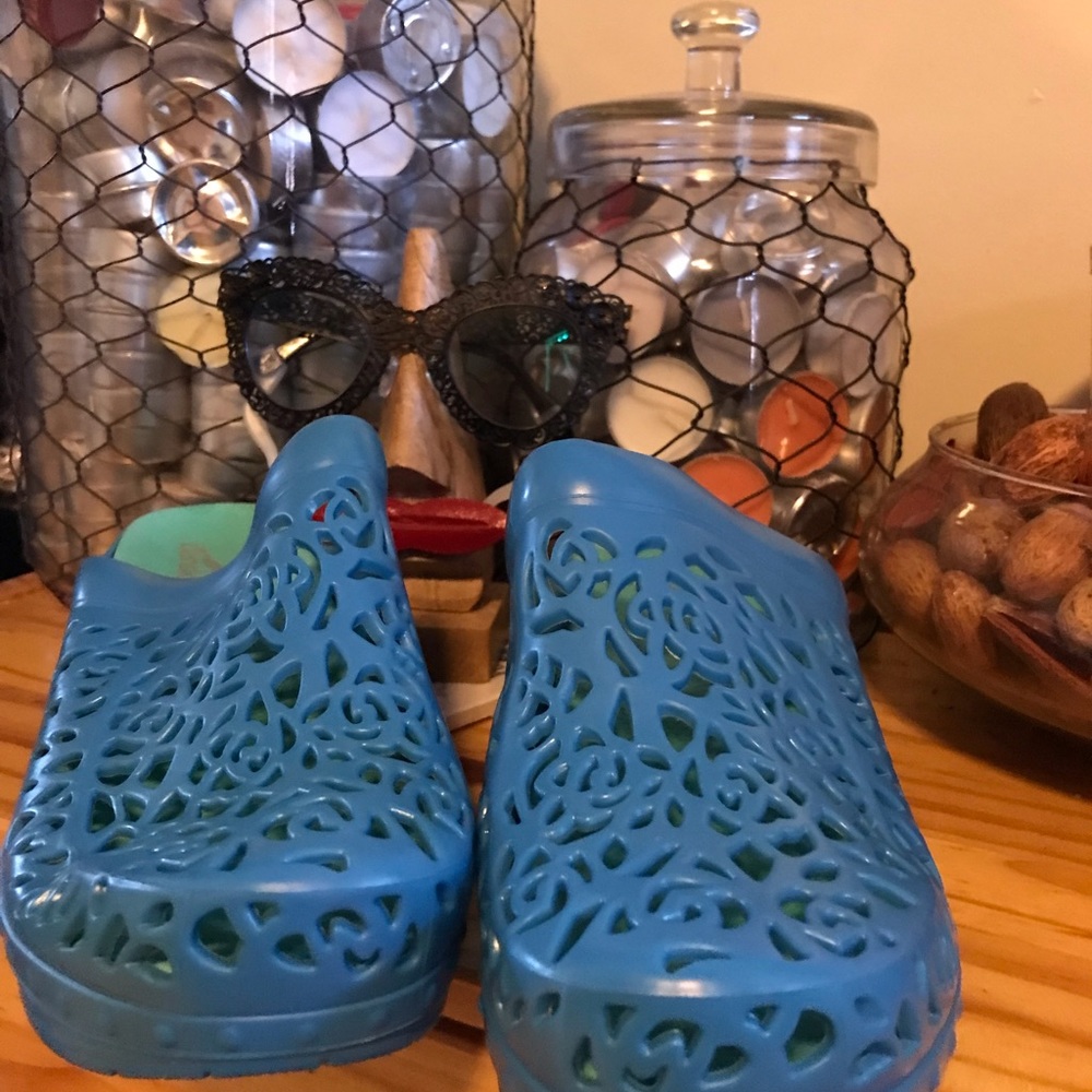 Dansko, Never Worn clog slide on! Very attractive in the prettiest blue.